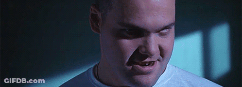 Man In White Shirt Making Angry Face GIF