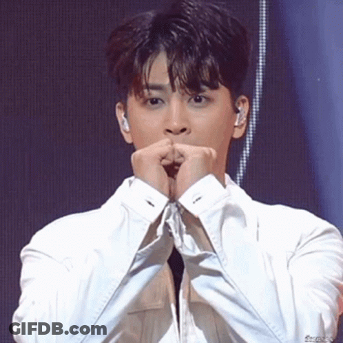 Man In White Shirt Making Face With Hands GIF