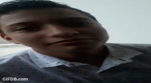 Man In White Shirt Making Funny Face GIF