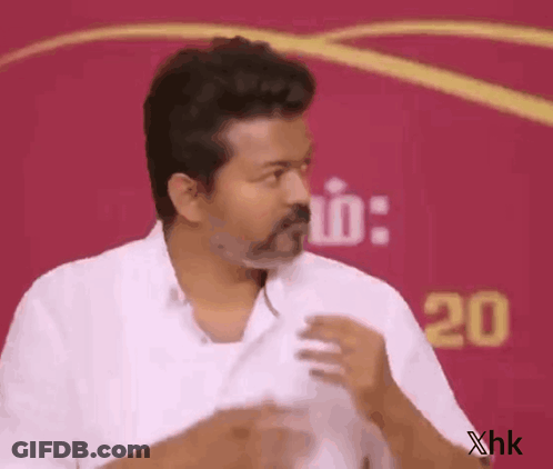 Man In White Shirt Making Funny Face GIF