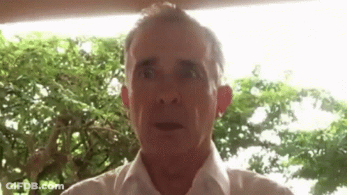 Man In White Shirt Making Funny Face GIF