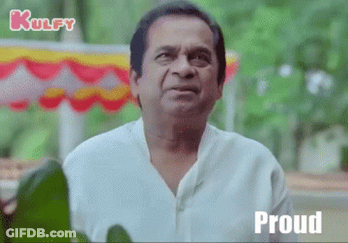 Man In White Shirt Making Funny Face Proud GIF