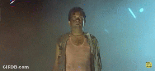 Man In White Shirt Making Funny Face Proud GIF