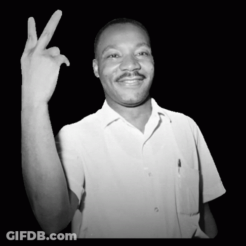 Man In White Shirt Making Peace Sign GIF