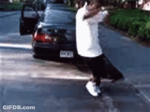 Man In White Shirt Next To Car With License Plate Aa GIF