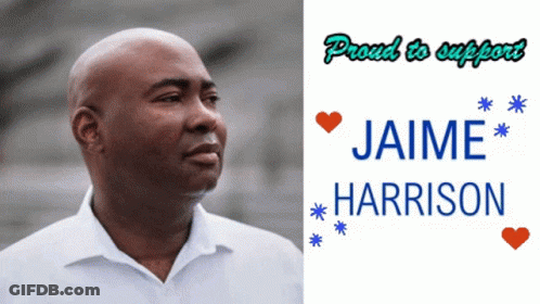 Man In White Shirt Next To Jaime Harrison Sign GIF