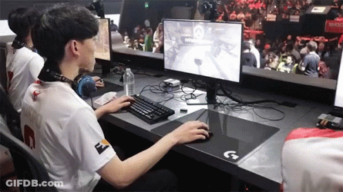 Man In White Shirt Number 2 Playing Video Game GIF