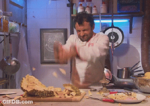Man In White Shirt Number 99 In Kitchen GIF