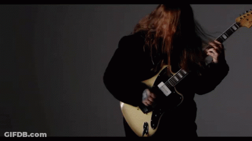 Man In White Shirt Playing Drums GIF
