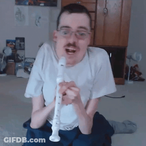 Man In White Shirt Playing Recorder With Mustache GIF