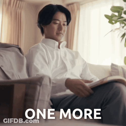 Man In White Shirt Reading Book Saying One More GIF