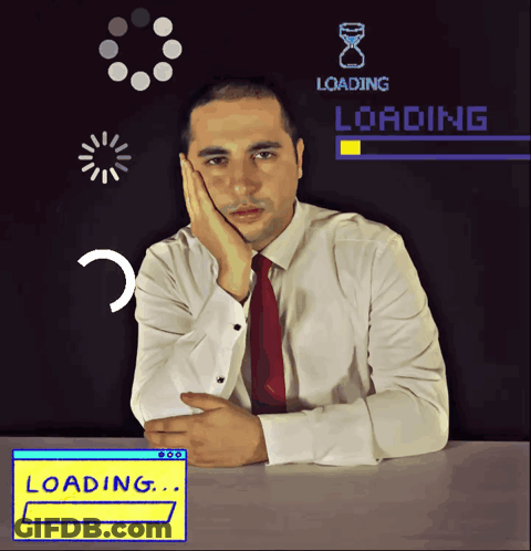 Man In White Shirt Red Tie At Table Loading Screen GIF