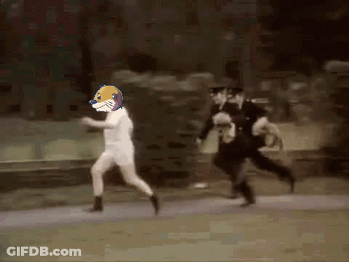 Man In White Shirt Running From Police GIF