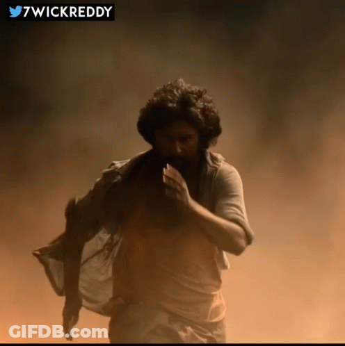 Man In White Shirt Running With Twitter Icon Saying 7Wickreddy GIF