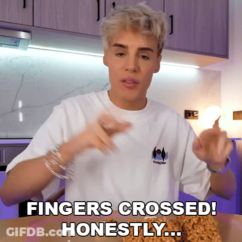 Man In White Shirt Saying Fingers Crossed GIF