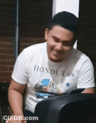 Man In White Shirt Saying Honduras Smiling GIF