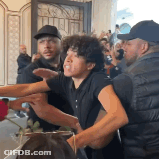 Man In White Shirt Saying Live Sage GIF