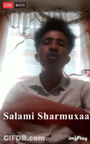 Man In White Shirt Saying Salami Sharmuxaa GIF
