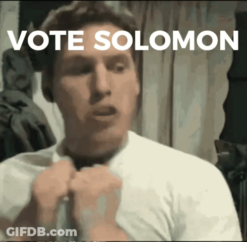 Man In White Shirt Saying Vote Solomon GIF