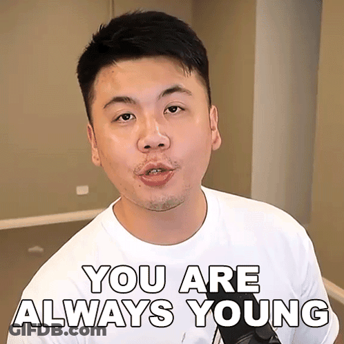Man In White Shirt Saying You Are Always Young GIF