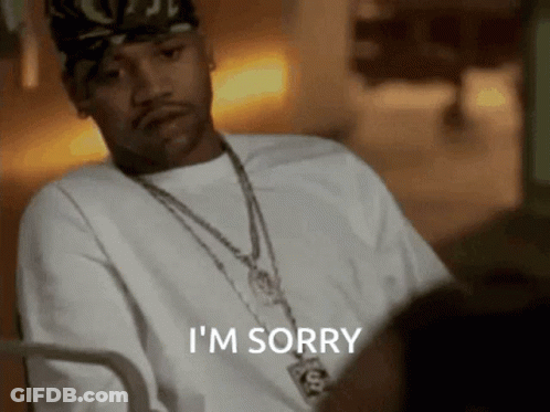 Man In White Shirt Says I'm Sorry With Necklace GIF