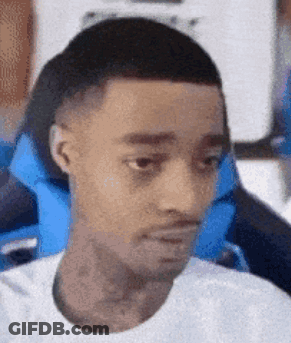 Man In White Shirt Sitting In Blue Chair GIF