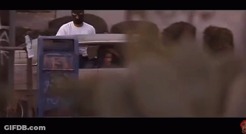 Man In White Shirt Sitting In Car In Dark Room GIF