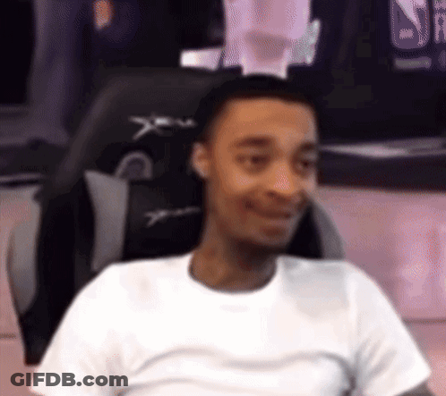 Man In White Shirt Sitting In Chair GIF