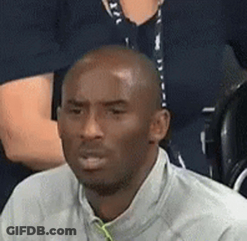 Man In White Shirt Sitting In Stadium With Woman GIF