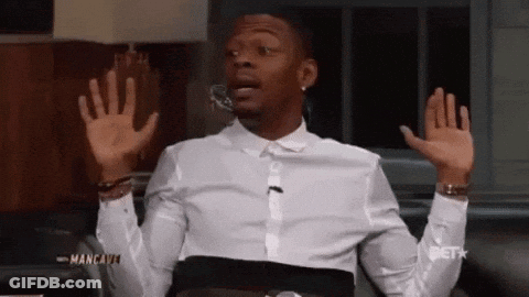 Man In White Shirt Sitting On Couch GIF