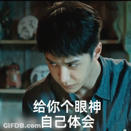 Man In White Shirt Sitting With Hands Folded GIF