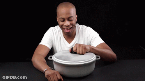 Man In White Shirt Smiling Opening Pot GIF