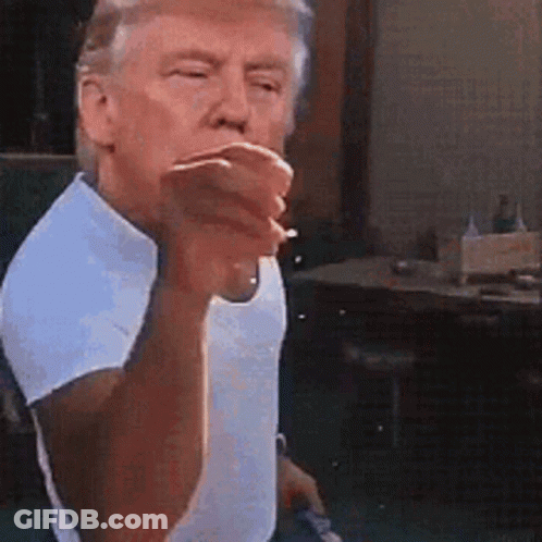 Man In White Shirt Smoking And Pointing GIF