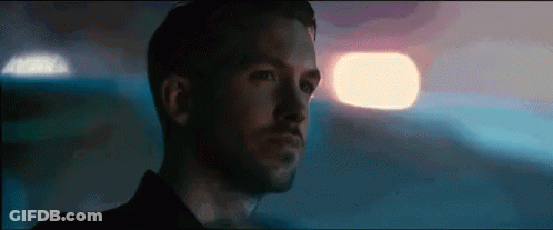 Man In White Shirt Standing In Field Saying We Fell In Love GIF