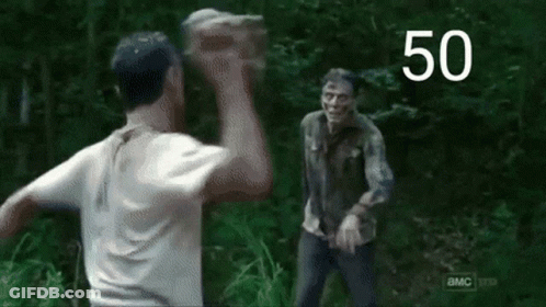 Man In White Shirt Standing In Forest With Number 50 GIF