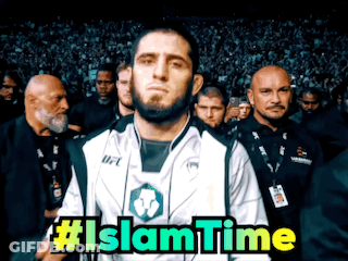 Man In White Shirt Standing In Front Of Crowd #Islamtime GIF