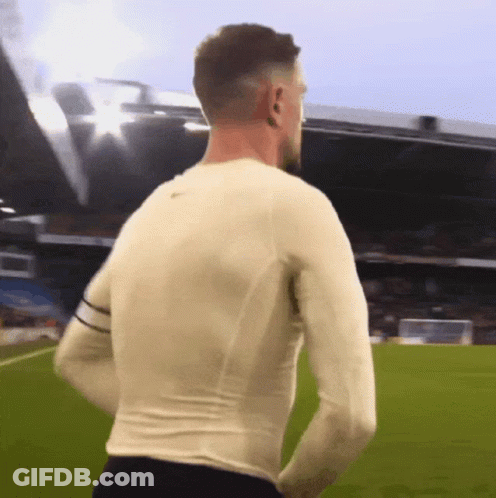 Man In White Shirt Standing On Field GIF