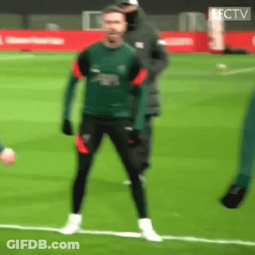 Man In White Shirt Standing On Field GIF