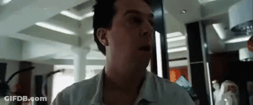 Man In White Shirt Standing GIF