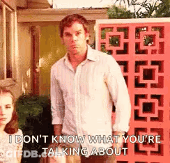 Man In White Shirt Talking To Woman GIF