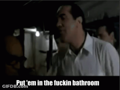 Man In White Shirt Telling Put Em In Bathroom GIF