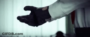 Man In White Shirt Tie Black Glove Reaching Out GIF
