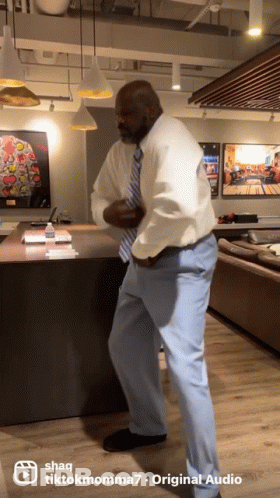 Man In White Shirt Tie Dancing With TikTokmoma7 GIF
