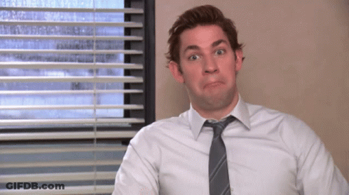Man In White Shirt Tie Making Funny Face GIF