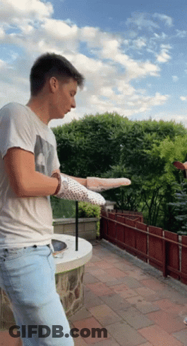 Man In White Shirt Tossing Pizza GIF