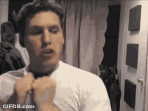 Man In White Shirt Tying Black Tie GIF