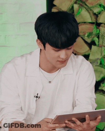 Man In White Shirt Using Tablet GIF