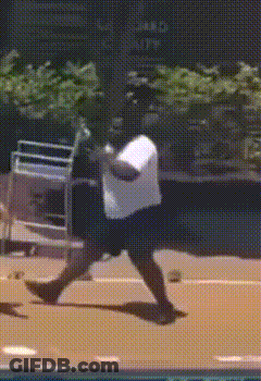 Man In White Shirt Walking On Tennis Court GIF