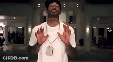Man In White Shirt Wearing JD Pendant GIF