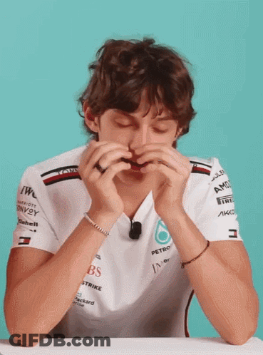 Man In White Shirt With AMD On Sleeves GIF